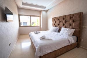 Postel nebo postele na pokoji v ubytování Maison Marrakech