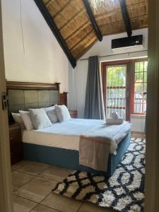 Giường trong phòng chung tại Goldpot Faerie Glen near Sun Bet Arena +43 ảnh