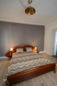Postel nebo postele na pokoji v ubytování Appartement de caractère