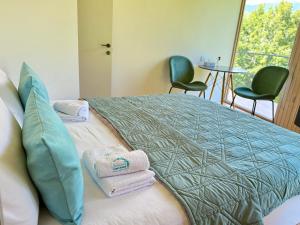Ένα ή περισσότερα κρεβάτια σε δωμάτιο στο Nature Rooms cabin