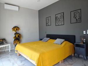 Postel nebo postele na pokoji v ubytování Casa Moreno Deluxe