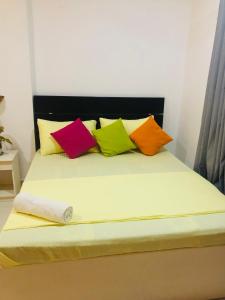Postel nebo postele na pokoji v ubytování Roo Lanka Homestay