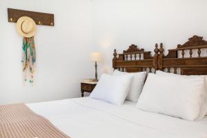 Letto o letti in una camera di Aldea