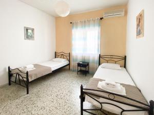 Postel nebo postele na pokoji v ubytování El Greco hotel by Estia