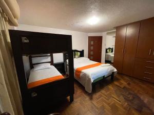 Postel nebo postele na pokoji v ubytování Hostel Tierra de Fuego