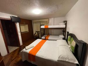 Postel nebo postele na pokoji v ubytování Hostel Tierra de Fuego