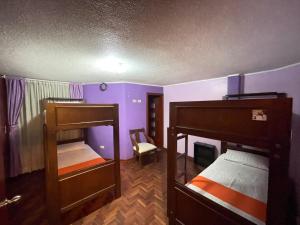 Postel nebo postele na pokoji v ubytování Hostel Tierra de Fuego