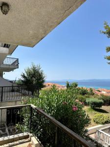 a balcony of a house with a view of the ocean at Sea La Vie - Premium in Polychrono