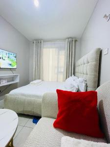 En eller flere senge i et værelse på Comfy homes 2