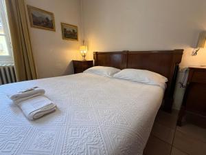 Albergo Dellangelo客房内的一张或多张床位