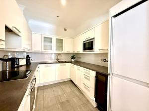 Η κουζίνα ή μικρή κουζίνα στο Covent Garden Apartments