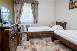 Postel nebo postele na pokoji v ubytování Villa Žerotín Penzion Bed & Breakfast