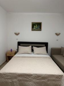Postel nebo postele na pokoji v ubytování Studio Apartments Domenik