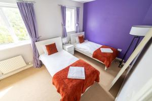 Postel nebo postele na pokoji v ubytování Contractors - Sleeps 8 - Double Driveway - City Centre - 3 Double Rooms - Garden - Coventry