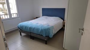 Postel nebo postele na pokoji v ubytování appartement de standing
