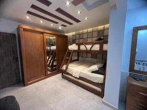A bed or beds in a room at شقه فندقيه