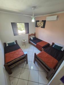 Ένα ή περισσότερα κρεβάτια σε δωμάτιο στο Casa Sobrado Águas de São Pedro