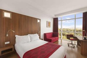 Katil atau katil-katil dalam bilik di Ramada Encore By Wyndham Tangier