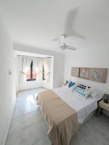 Postel nebo postele na pokoji v ubytování Apartamentos Libertad