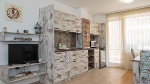 Η κουζίνα ή μικρή κουζίνα στο Lora boutique