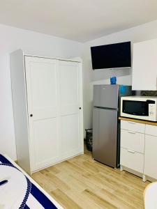 Kuchnia lub aneks kuchenny w obiekcie Sunrise