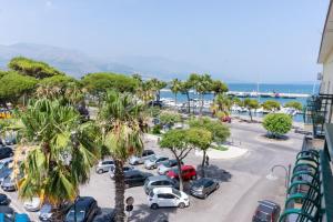 a parking lot with a bunch of cars parked at Luma Casa Vacanze in Gaeta