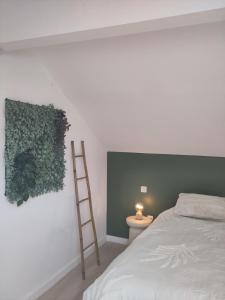 Postel nebo postele na pokoji v ubytování L'herbe Hôtes + 18 fotografií