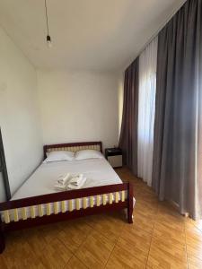 Postel nebo postele na pokoji v ubytování Hotel LULI