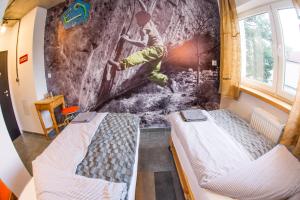 Posteľ alebo postele v izbe v ubytovaní Trafo Base Camp