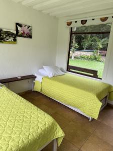 Postel nebo postele na pokoji v ubytování OASSIS CONEXION SIN FRONTERAS