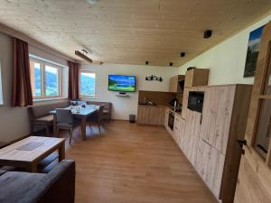 Kuchyň nebo kuchyňský kout v ubytování Naturchalet Forster
