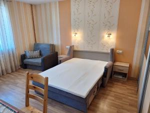 Giường trong phòng chung tại Vītols