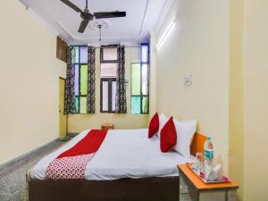 Voodi või voodid majutusasutuse Hotel O Smart View toas