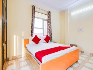 Voodi või voodid majutusasutuse Hotel O Smart View toas