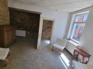 Posezení v ubytování la maisonnette du vieux spa
