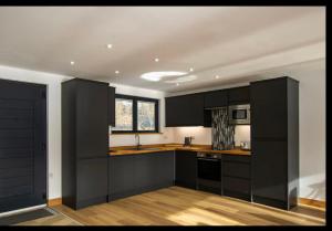 Kuchyň nebo kuchyňský kout v ubytování Lakeview House