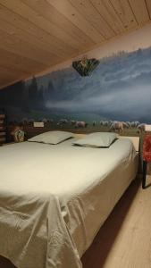 Postel nebo postele na pokoji v ubytování Vakantiewoning De Specht