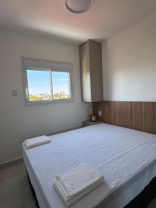 Ένα ή περισσότερα κρεβάτια σε δωμάτιο στο Conforto, praticidade e vista incrível – perto do centro de Bauru