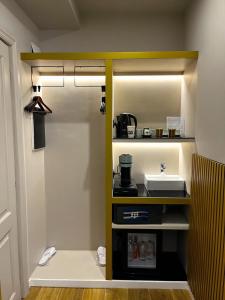 Kuchyň nebo kuchyňský kout v ubytování Mavi Luxury Suites