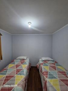 Postel nebo postele na pokoji v ubytování cabañas don Jose