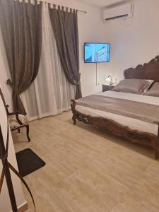 Posteľ alebo postele v izbe v ubytovaní Villa Belvedere