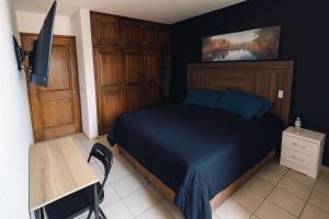 Postel nebo postele na pokoji v ubytování Casa Cómoda con Jacuzzi, Cochera, Terraza y Jardín