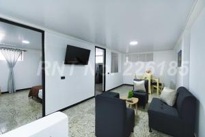 TV a/nebo společenská místnost v ubytování Apartamento Centrico a 30 minutos de Termales