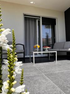 Χώρος καθιστικού στο Tina Little Paradise