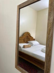Postel nebo postele na pokoji v ubytování Hello Rafiki GuestHouse - Mkunazini