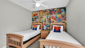 Ένα ή περισσότερα κρεβάτια σε δωμάτιο στο Amazing House 5BR 3B 15 min from Disney World