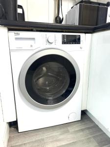 Η κουζίνα ή μικρή κουζίνα στο Stylish Studio Apartment