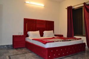 Postel nebo postele na pokoji v ubytování Hotel Pine breeze