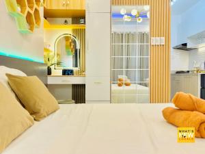Ένα ή περισσότερα κρεβάτια σε δωμάτιο στο Solaria Haven Cozy & Family Friendly Studio in Bacolod +22 φωτογραφίες