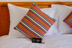 Rúm í herbergi á Saphi Inn Cusco - Excelente ubicación